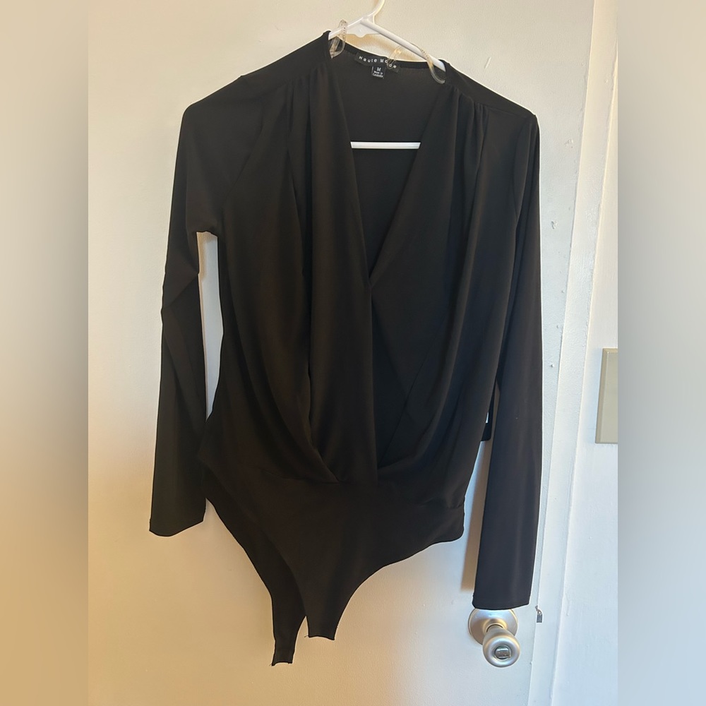 Black long sleeve snap front wrap body suit
